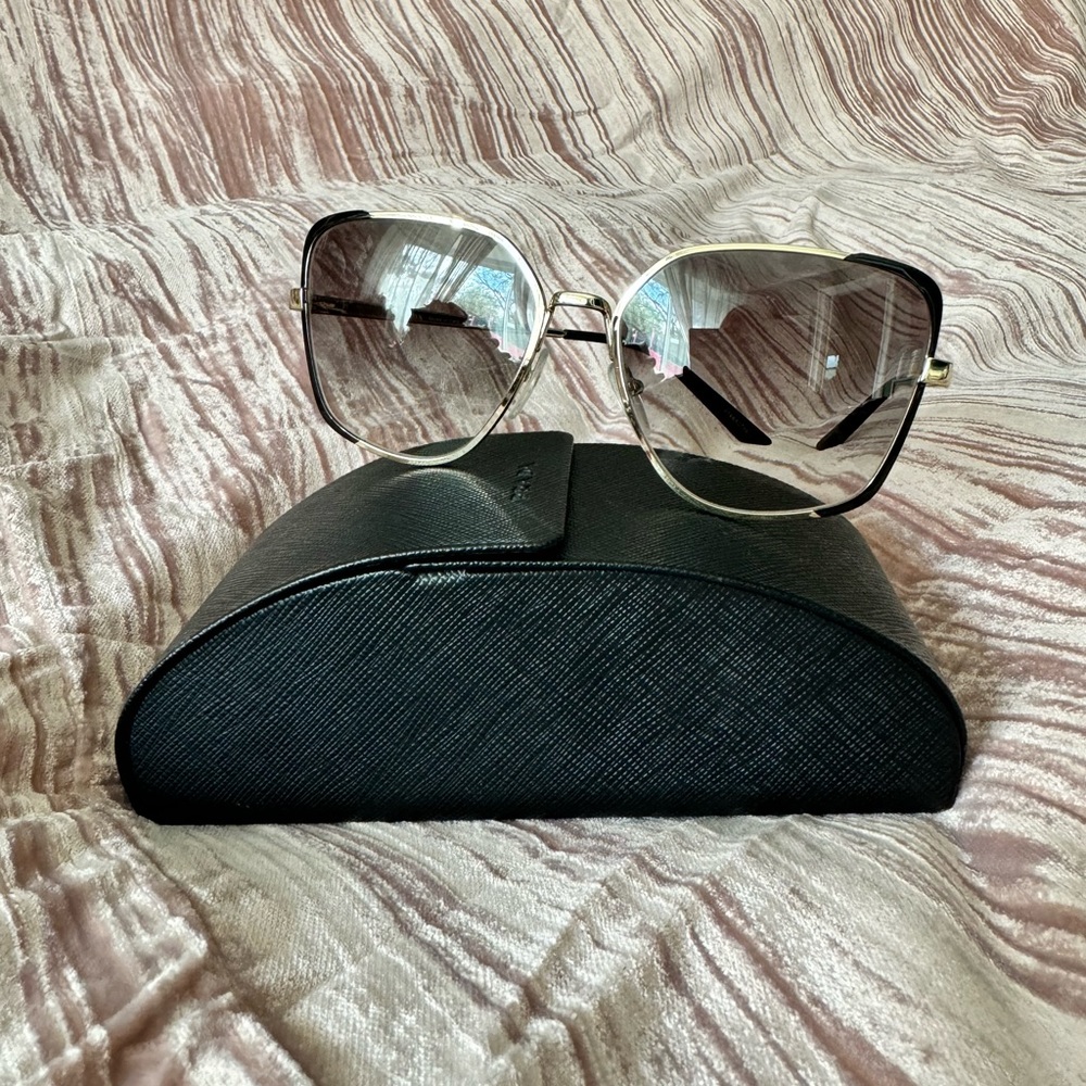 Prada Cat Eye Gold/Black Sunglasses with gradient lenses